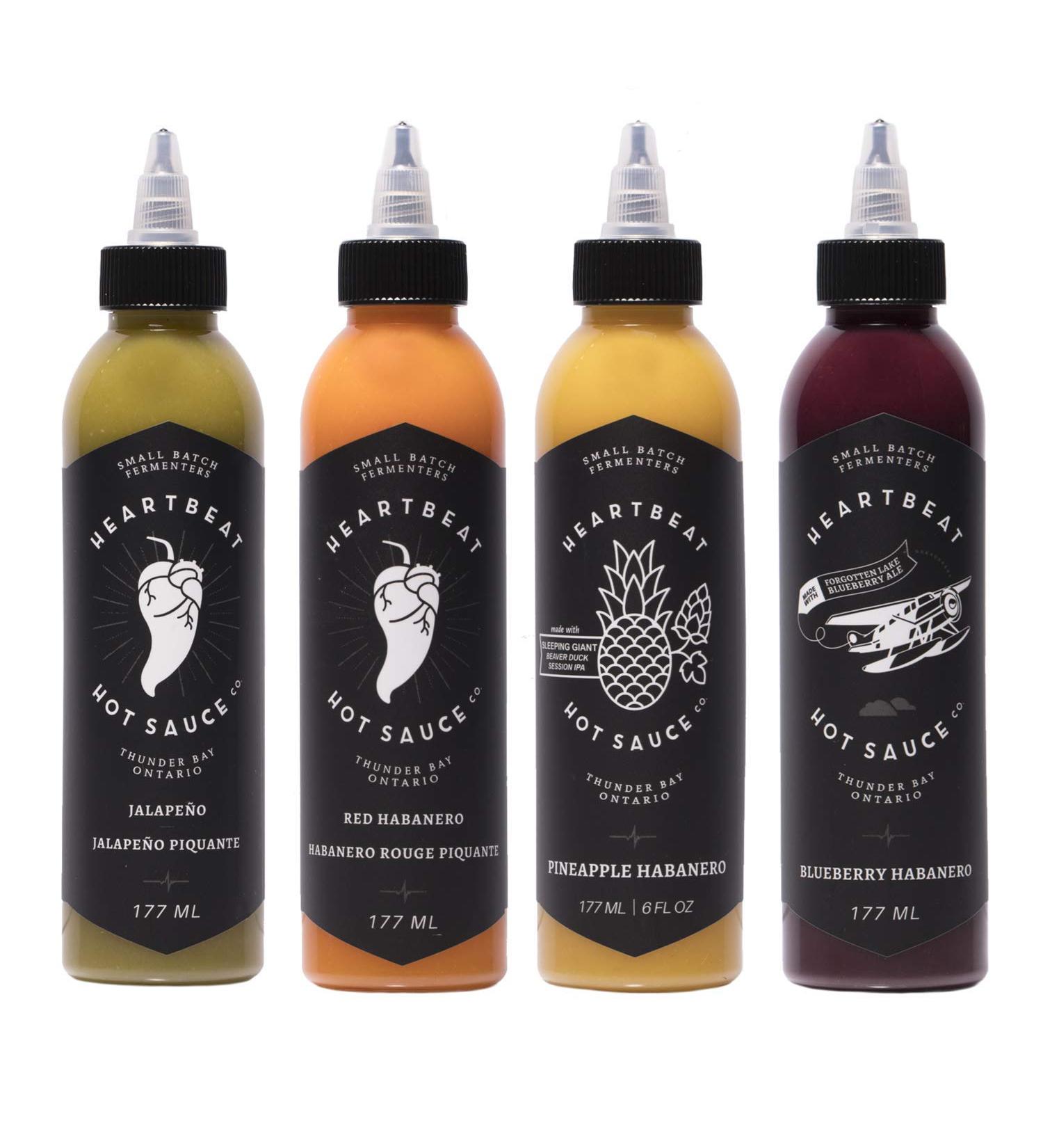 Heartbeat Hot Sauce 4 Pack- 4 Bottles of 6 oz- Small Batch & Handmade, Vegan, Preservative Free- Pineapple Habanero, Red Habanero, Blueberry Habanero, Jalapeño