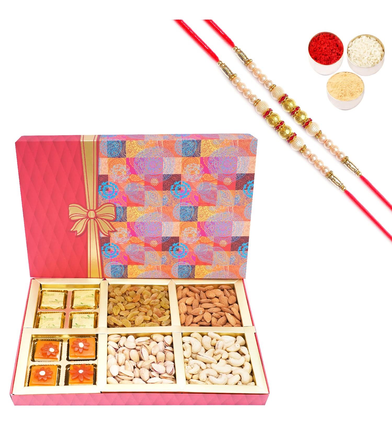 Ghasitaram Gifts Rakhi Gifts for Brothers Dryfruit - Fruit n Nut Box of 4 Dryfruits MEWA Bites and Mango Bites with 2 Pearl Rakhis Box of 4 Dryfruits MEWA Bites Mango Bites 2 Rakhis - Buy Online on GoSupps.com