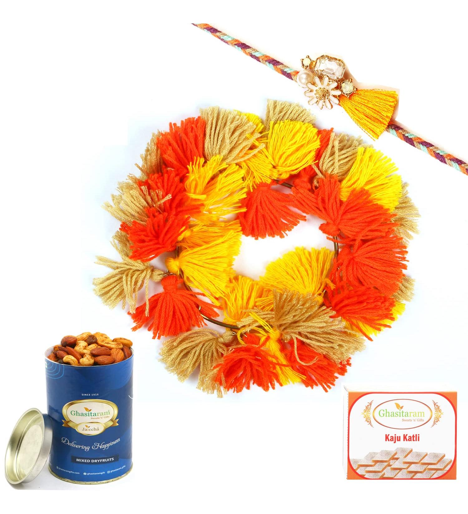 Ghasitaram Gifts Rakhis Online - Rakhi for Brother-RM-268 Bhaiya Bhabhi Rakhi with 100 GMS of Dryfruits Mix Can 200 GMS of Kaju katli Rakhi Set & 100g Dryfruits Mix Can 200g Kaju katli - Buy Online on GoSupps.com