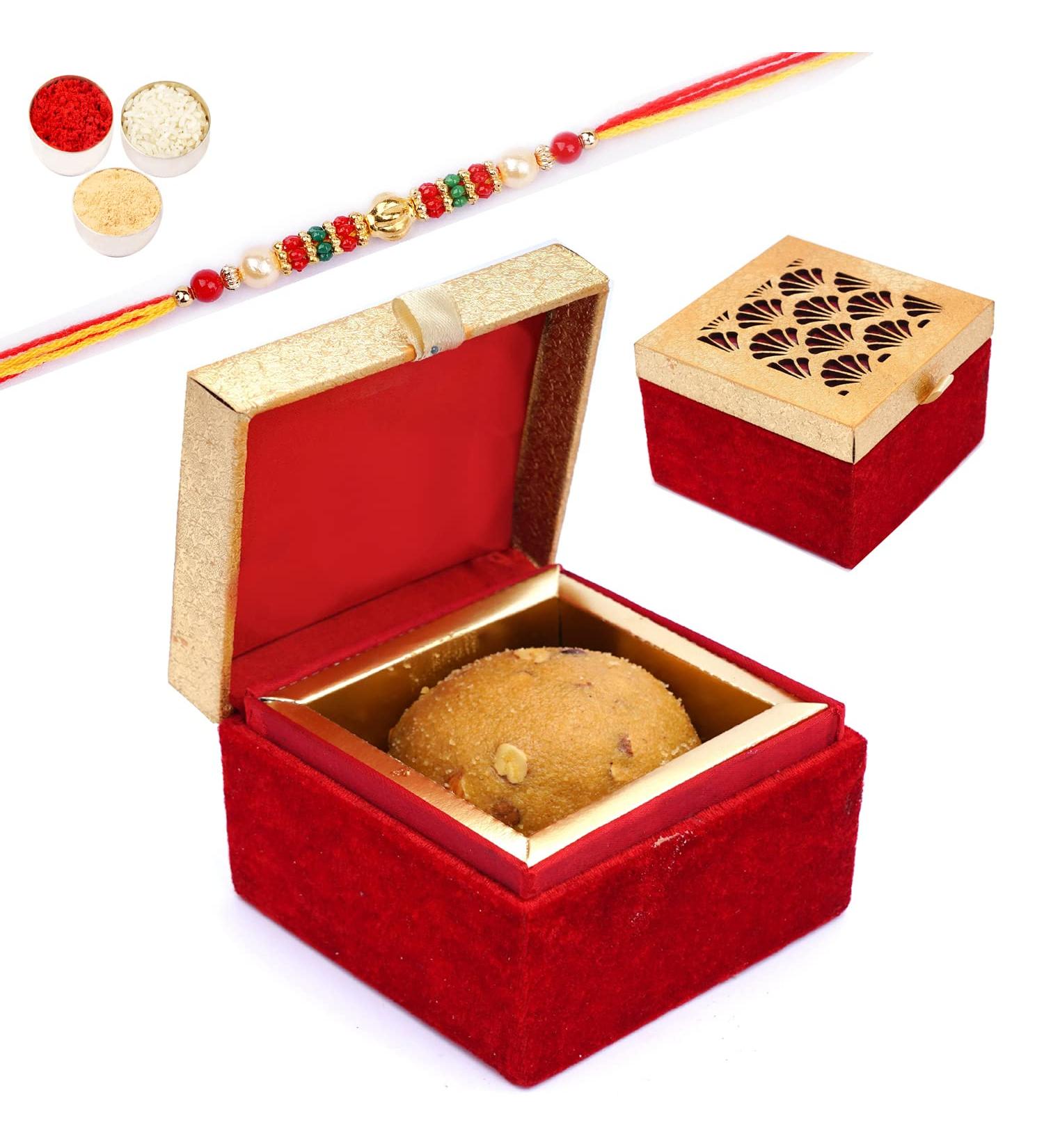 Ghasitaram Gifts Rakhi Gifts for Brothers Laddoo Box of Panjeeri Laddoo with Pearl Beads Rakhi - Buy Online on GoSupps.com