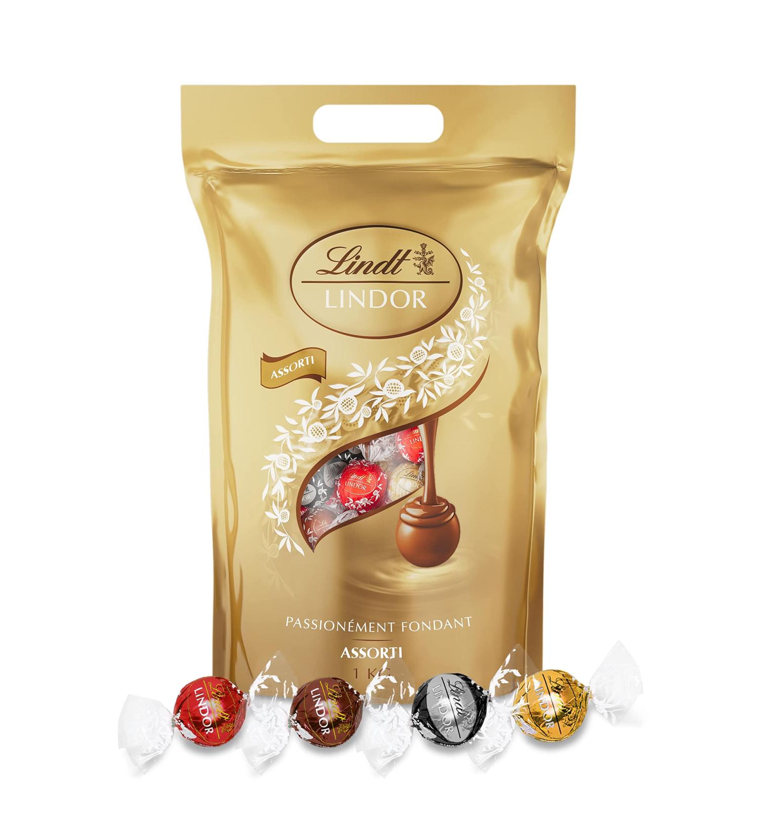 Lindt - Sachet Grand format LINDOR - Assortiment de Chocolats au Lait Noir 60% Blanc et Lait-Noisettes - C ur Fondant 1kg - Buy Online on GoSupps.com