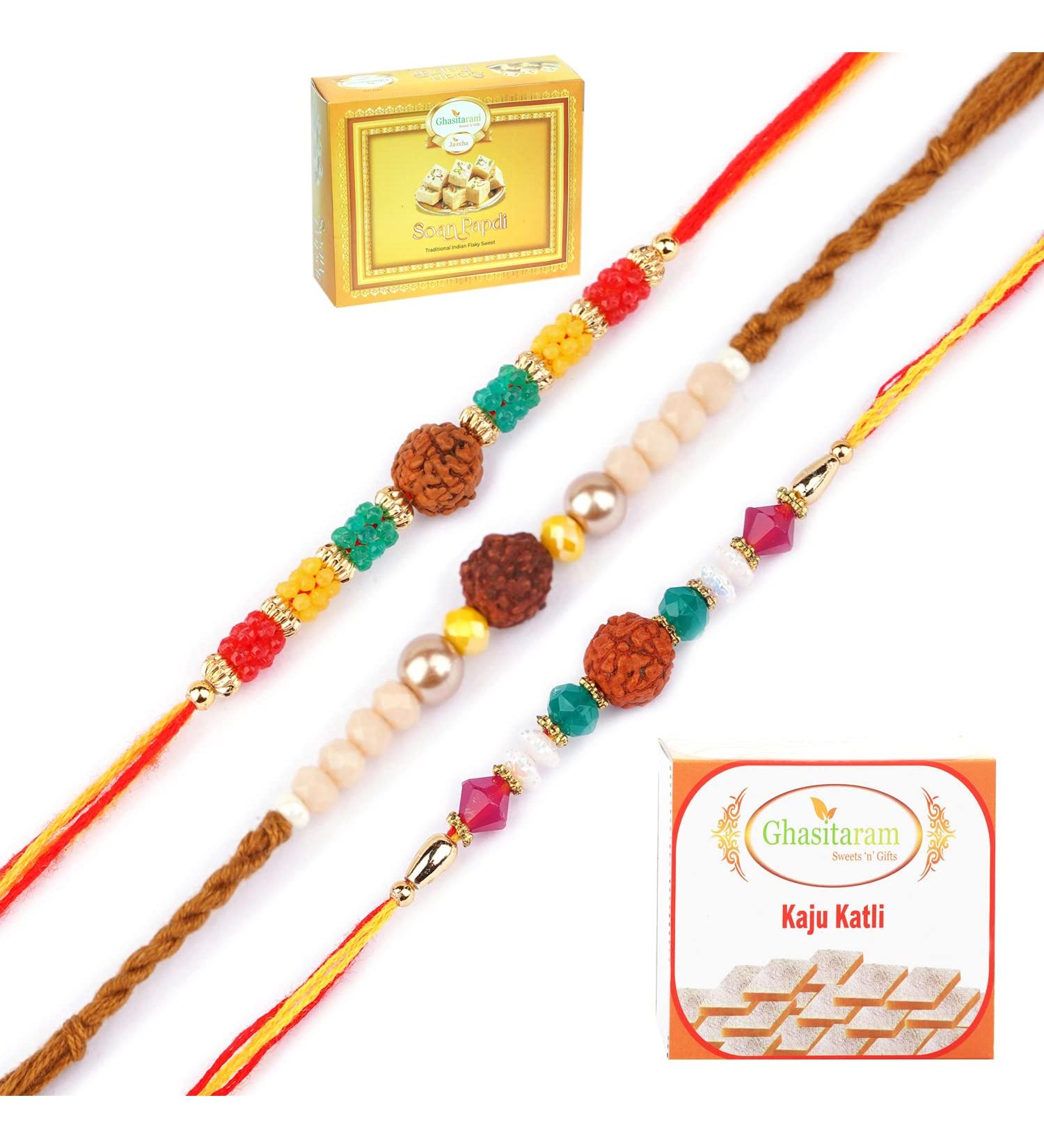 Ghasitaram Gifts Rakhi for Brother Rakhis Online - Set of 3-1986 1988 1908 Rudraksh Rakhis with 200 GMS of Kaju katli and 200 GMS of Soan Papdi - Buy Online on GoSupps.com