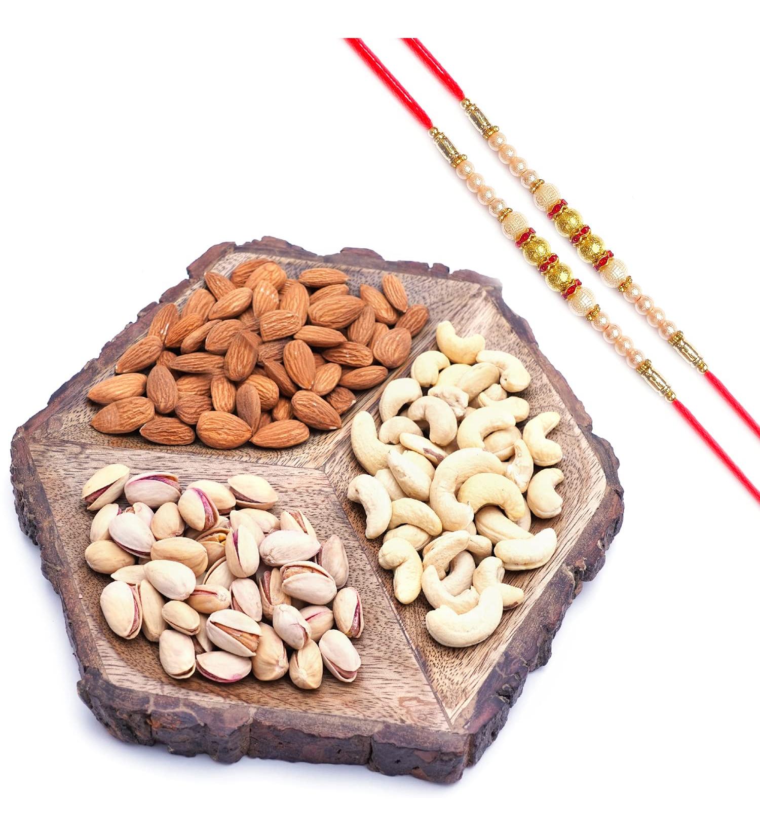 Ghasitaram Gifts Rakhi Gifts for Brothers Dryfruit - Hexagon Log Platter with Dryfruits with 2 Pearl Rakhis - Buy Online on GoSupps.com