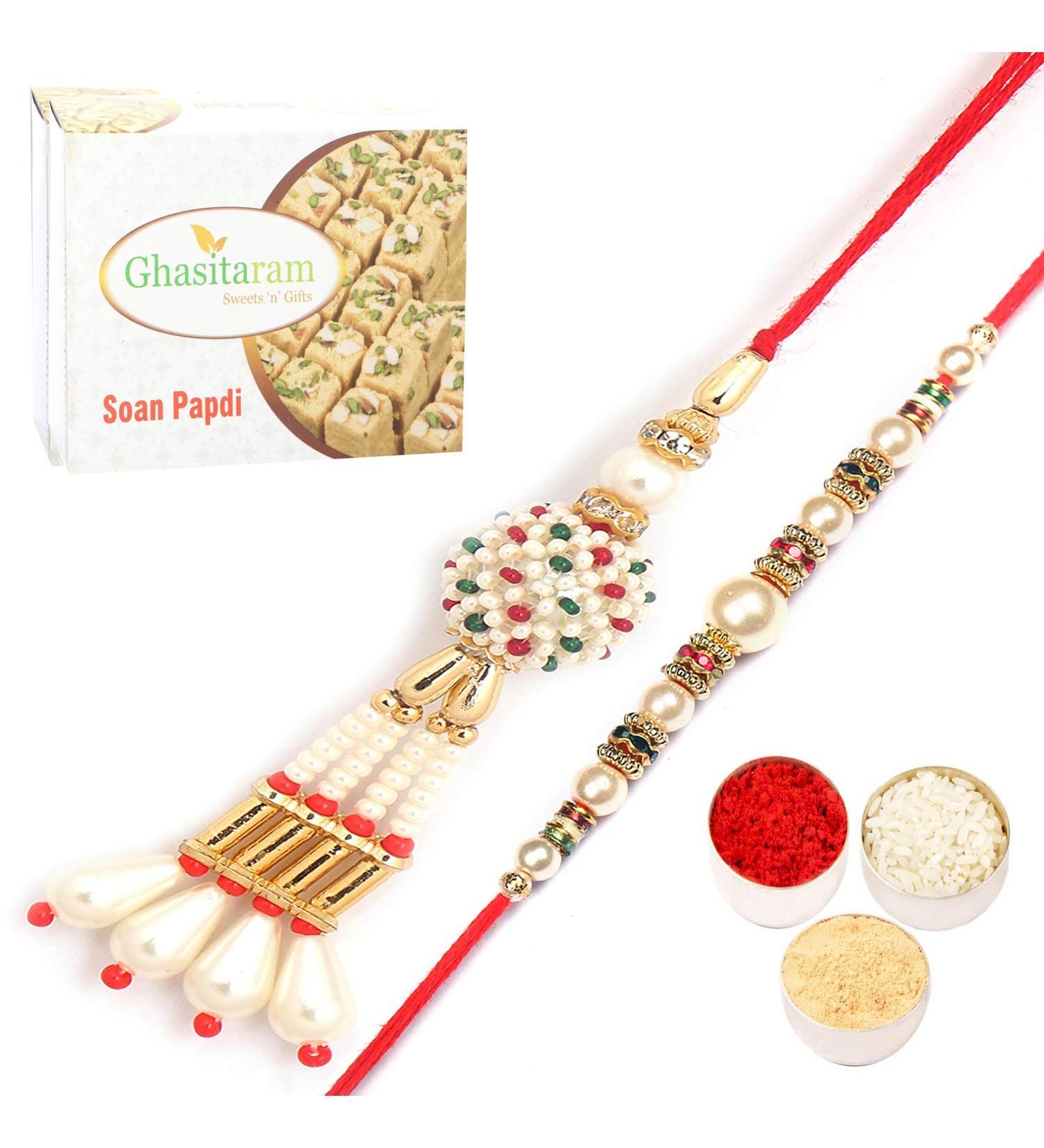Ghasitaram Gifts Rakhis Online- Shimmering Blessings cl6101 Bhaiya Bhabhi Rakhi with 400 GMS of Soan Papdi - Buy Online on GoSupps.com