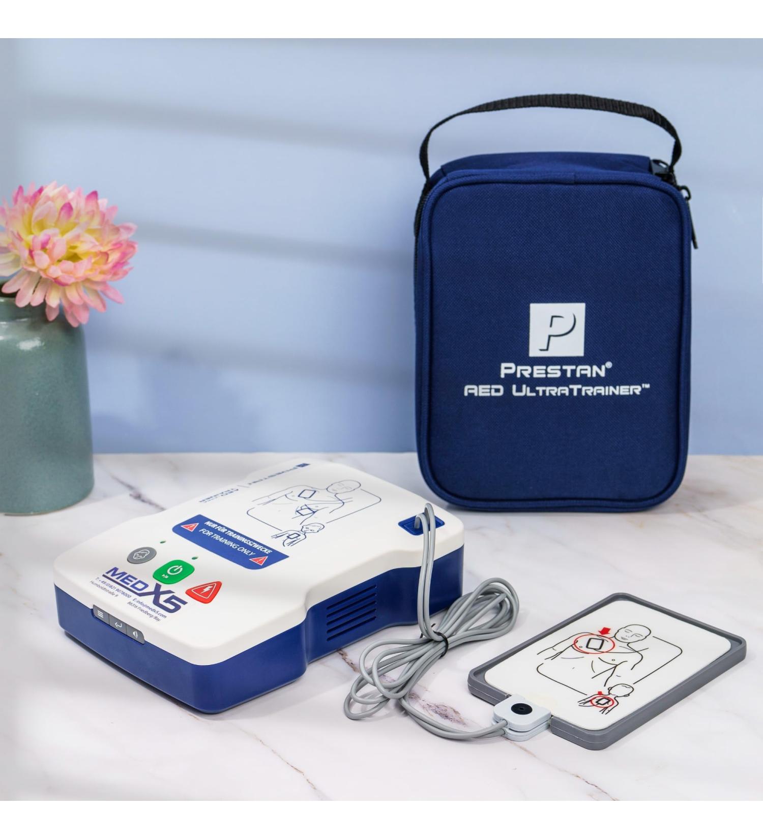 Universal AED/Defibrillator UltraTrainer - English & German 3 Jahre Herstellergarantie | Jetzt international bestellen - Buy Online on GoSupps.com