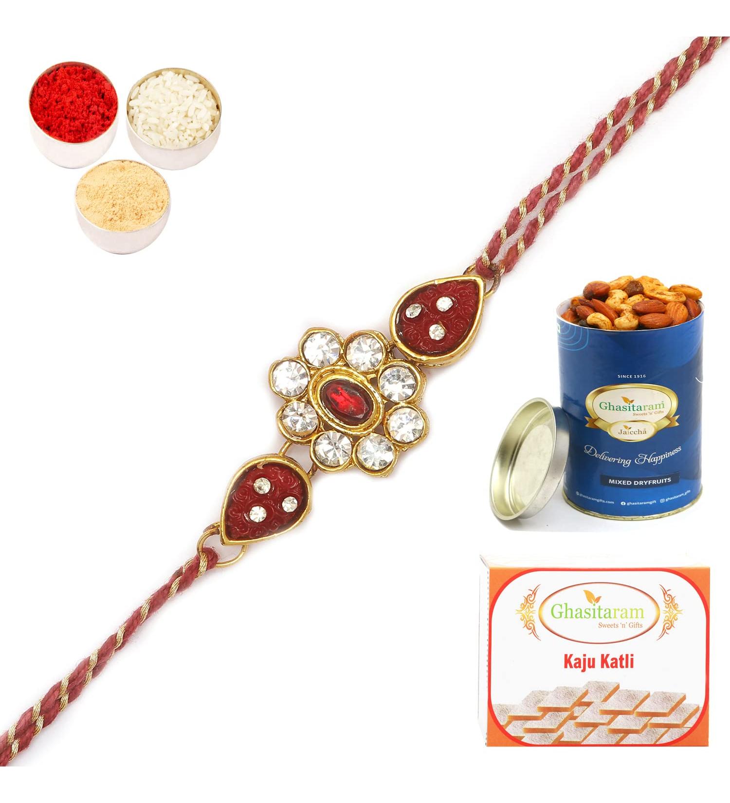 Ghasitaram Gifts Rakhis Online - J-31062 Rose Flower Jewel Rakhiwith 100 GMS of Dryfruits Mix Can 200 GMS of Kaju katli Rakhi & 100g Dryfruits Mix Can 200g Kaju katli - Buy Online on GoSupps.com