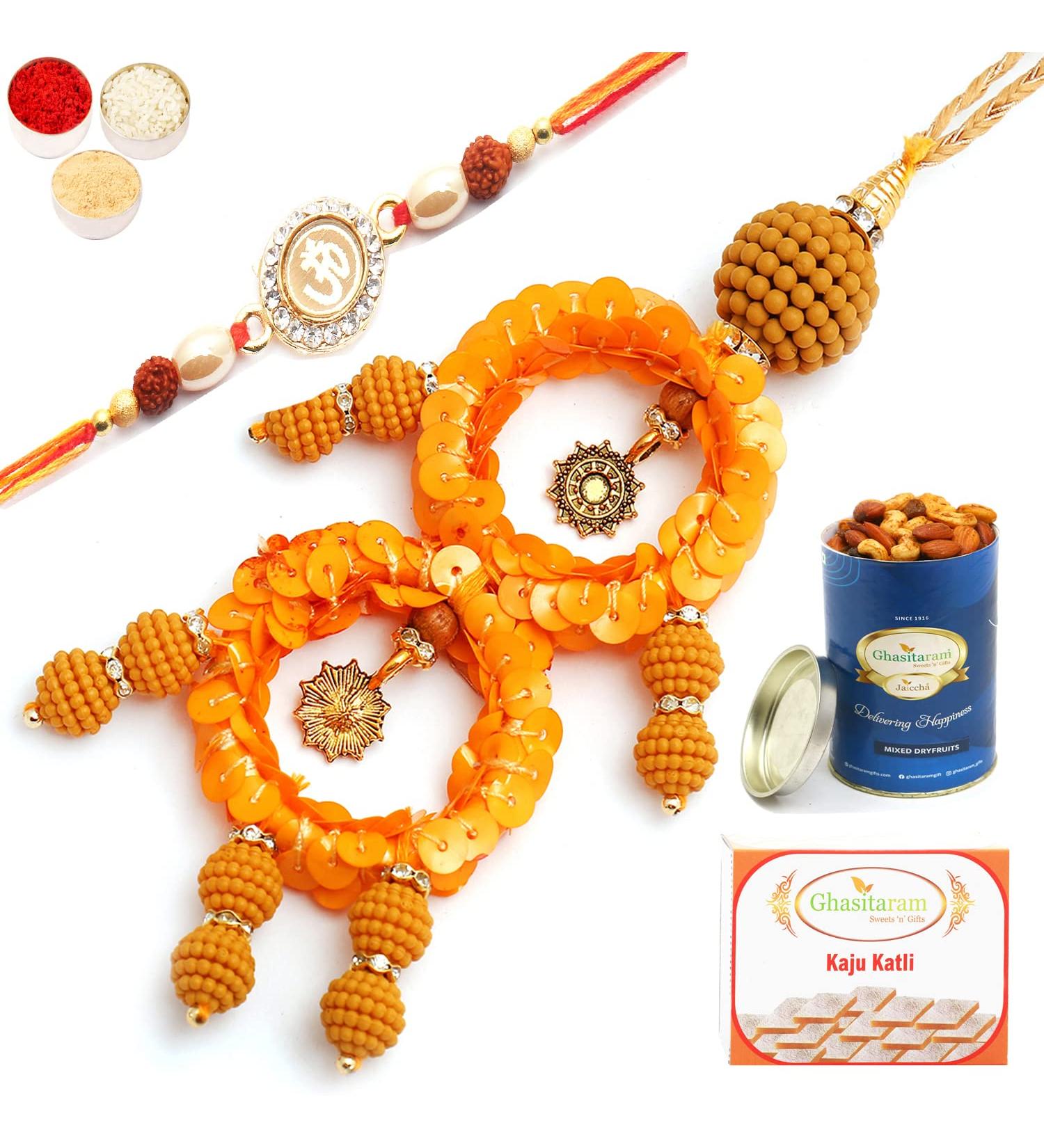 Ghasitaram Gifts Rakhis Online - Rakhi for Brother- Sisters Blessings rm073 Bhaiya Bhabhi Rakhi with 100 GMS of Dryfruits Mix Can 200 GMS of Kaju katli Rakhi Set & 100g Dryfruits Mix Can 200g Kaju katli - Buy Online on GoSupps.com
