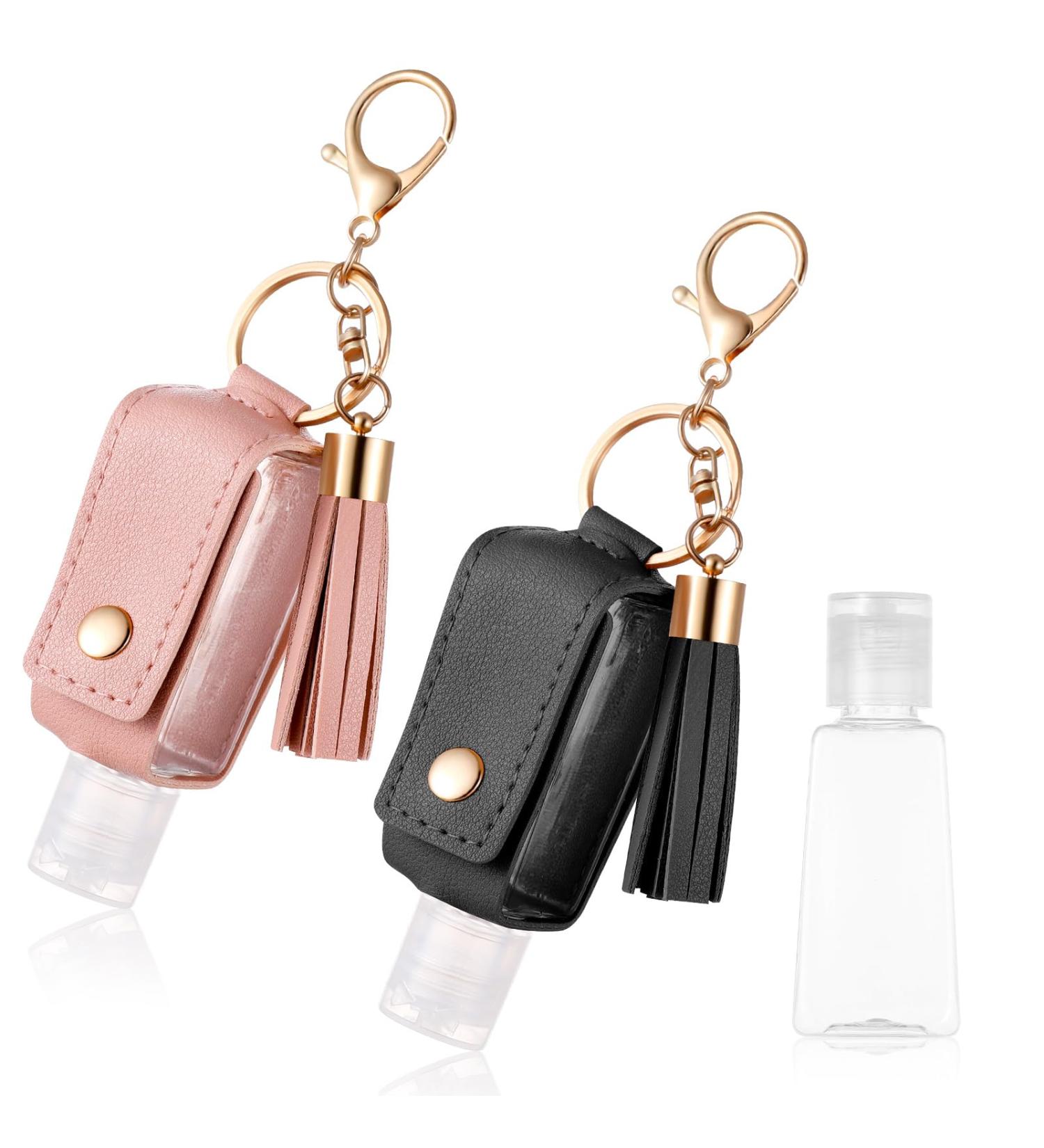 2Pcs Hand Sanitizer Keychain | Portable Leather Holder (30ml) for Travel | Refillable Case for Lotion & Liquid Soap - Black & Pink - Buy Online on GoSupps.com