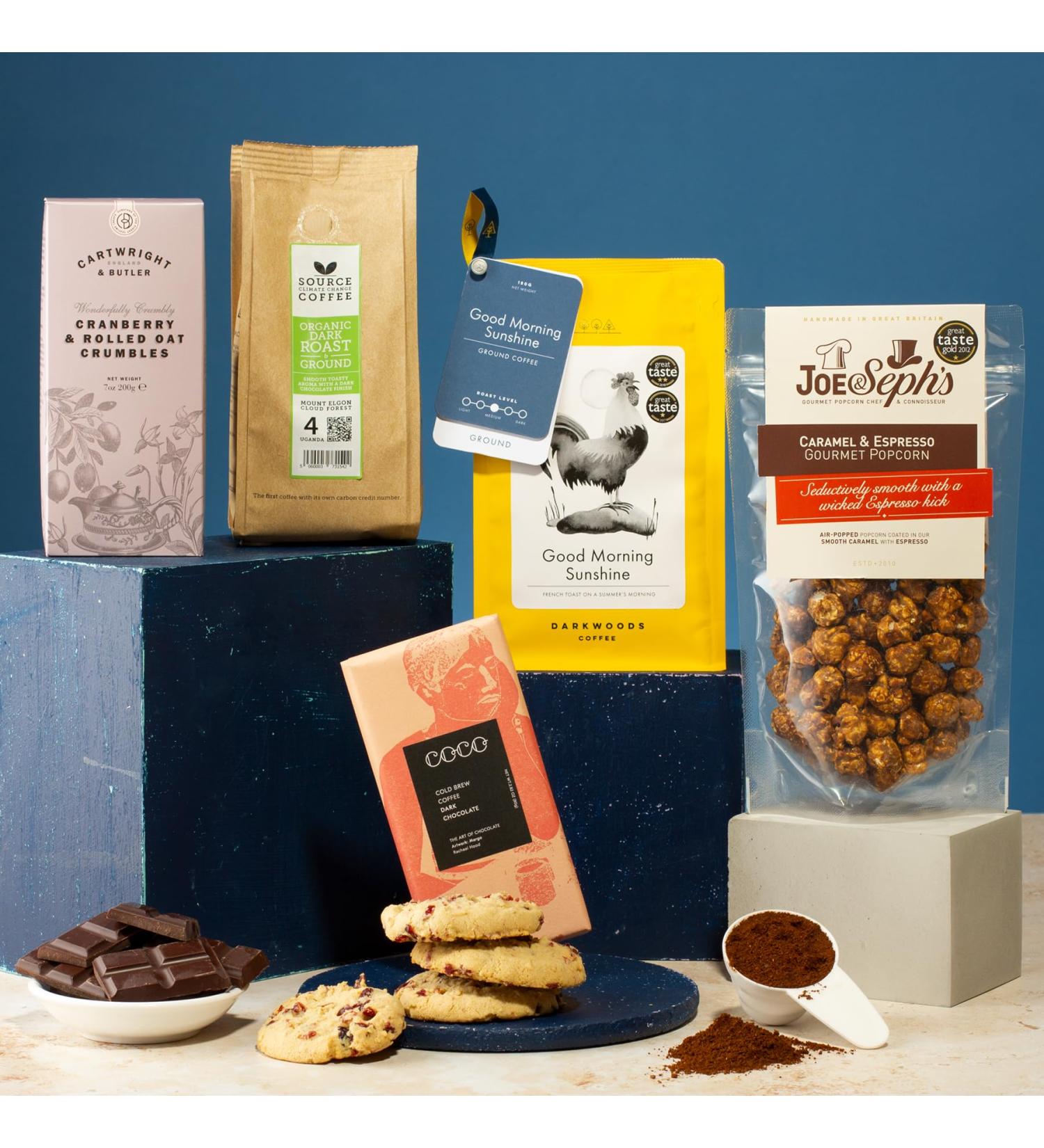 Coffee Lovers Gift Box. 2 bags of coffee and 4 sweet snacks such as chocolate and biscuits.