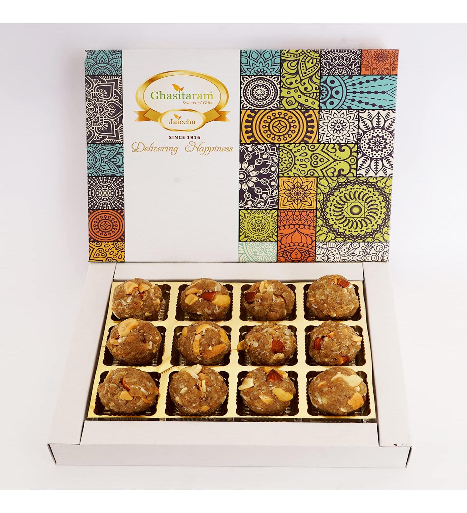 Ghasitaram Gifts Jaiccha Lohri Sweets Gachak hampers Gond Dryfruit Laddoo 12 pcs - Buy Online on GoSupps.com