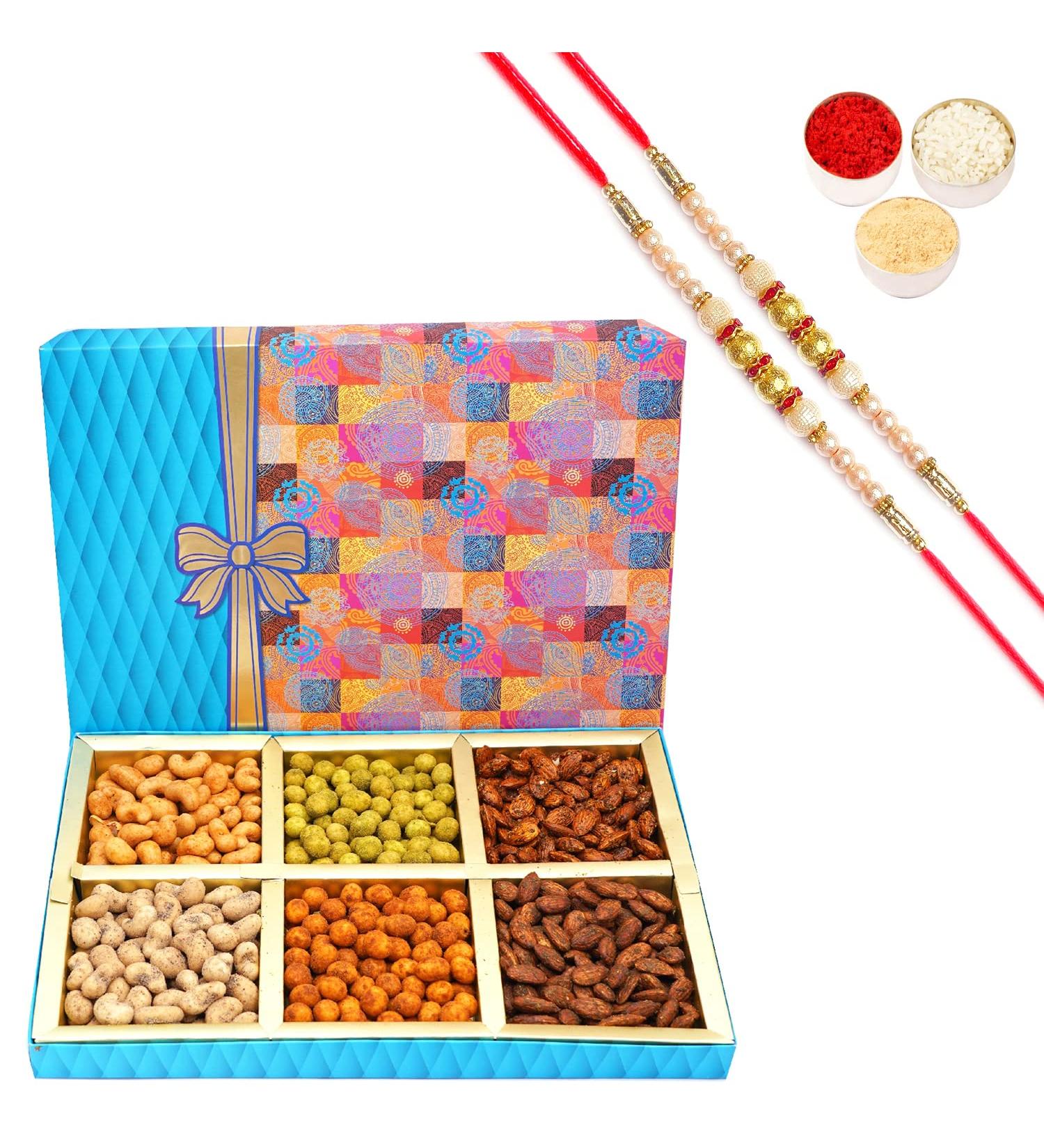 Ghasitaram Gifts Rakhi Gifts for Brothers Dryfruit - Fruit n Nut 6 Part Box of Crunchy Cashews Crunchy Peanuts and Flavoured Almonds 600 GMS with 2 Pearl Rakhis - Buy Online on GoSupps.com