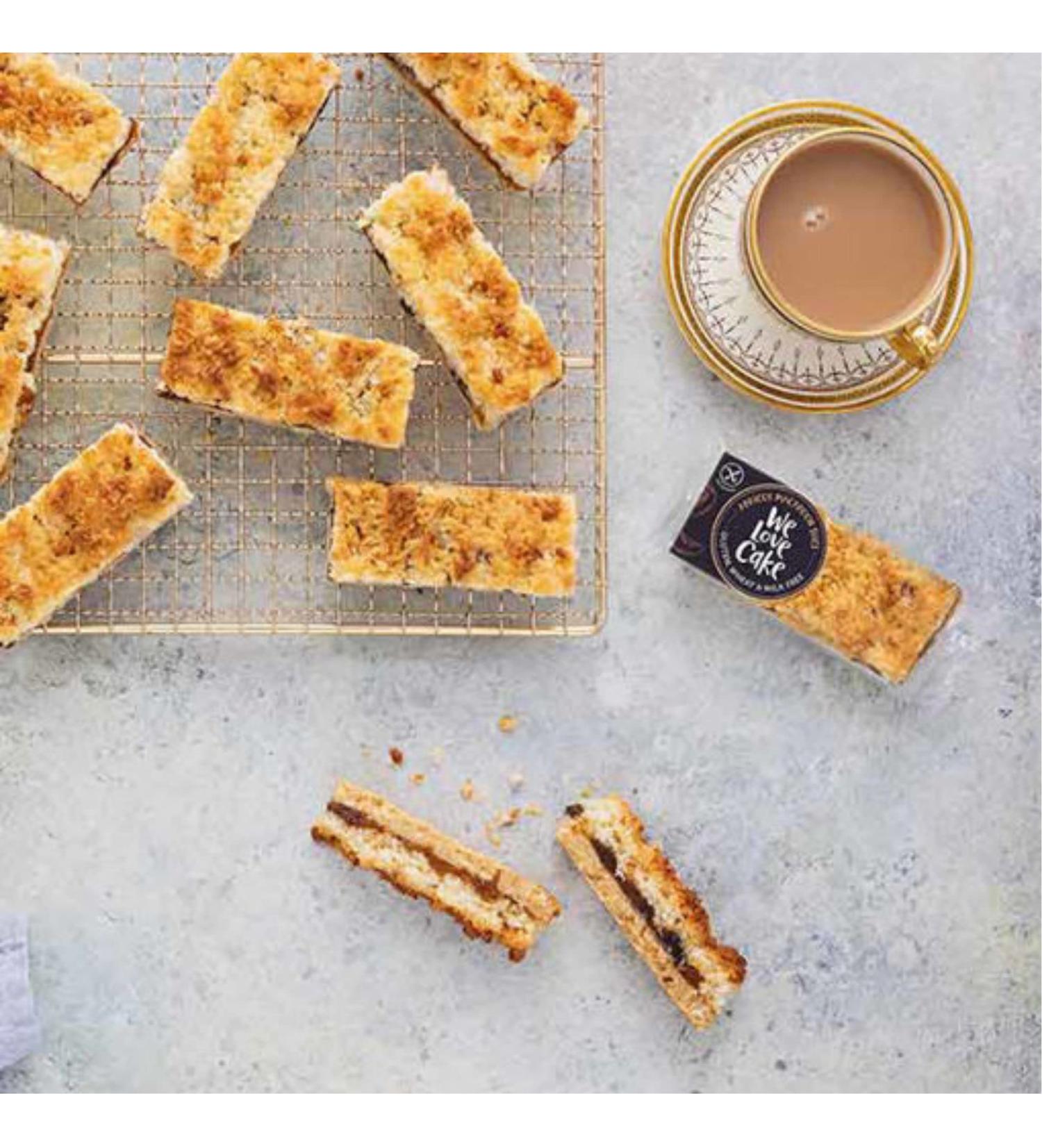 Apricot Macaroon Slices(18) ..Gluten wheat & dairy free. Individually wrapped. Shortbread bases with apricot filling & toasted coconut topping.