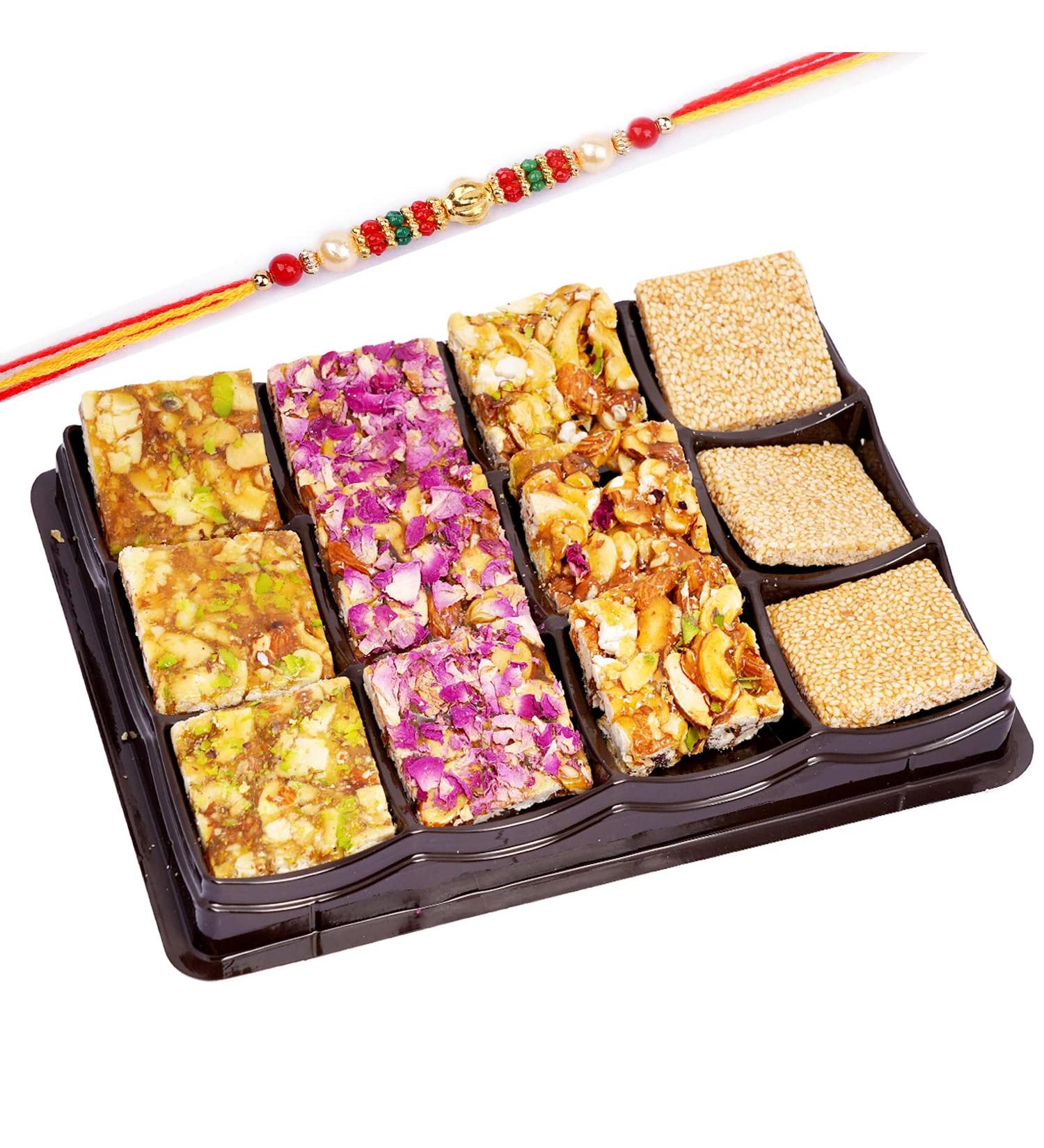 Ghasitaram Gifts Rakhi Gifts for Brothers Assorted Chikki Lid Box with Pearl Beads Rakhi - Buy Online on GoSupps.com