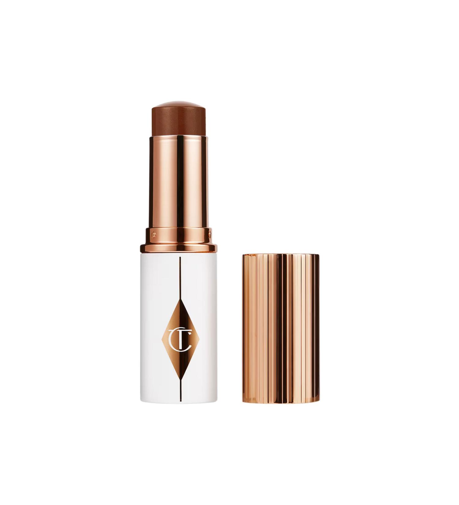 charlotte tilbury With Its Shiny Look - Unreal Skin Sheer Glow Tint - 15 Deep (8 g)NATURAL BEAUTY54
