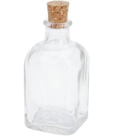 Elegant and stylized glass bottle with salt worm for mezcal from Mexico - Buy Online on GoSupps.com