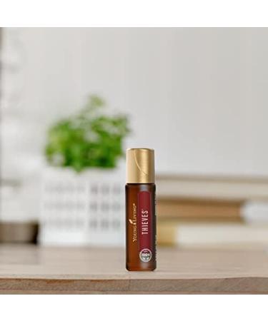 Buy Young Living Thieves Roll-On 10ml | Pre-Diluted Essential Oil Blend | Clove Lemon Cinnamon & Eucalyptus for On-the-Go Use | Shop Internationally - Buy Online on GoSupps.com