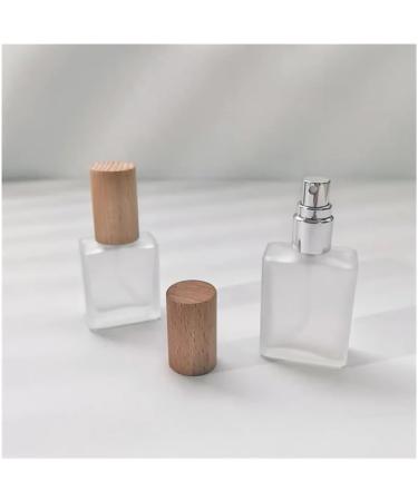 Travel-Friendly Frosted Glass Spray Bottle - Refillable Perfume & Makeup Container (Silver) | Eco-Friendly & Stylish - Buy Online on GoSupps.com