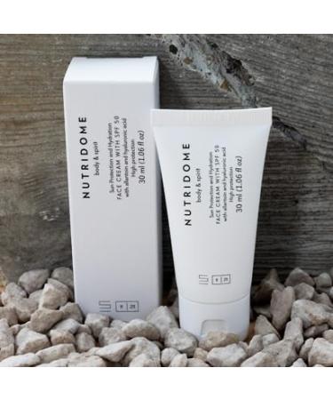 Nutridome Sp z oo Nutridome Face Cream SPF 50 30 ml protects against the sun for all skin types moisturizes smoothes improves elasticity is quickly absorbed no sticky feeling under makeup - Buy Online on GoSupps.com