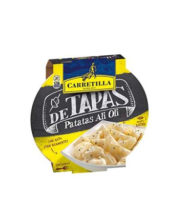 Ration of cooked potatoes with ali oli sauce (garlic and oil).