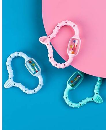 Curaprox Turquoise Baby Bite Ring with Rattle & Learning Toothbrush - BPA-Free Teething Toy 1 Piece for Baby's Dental Care - Buy Online on GoSupps.com