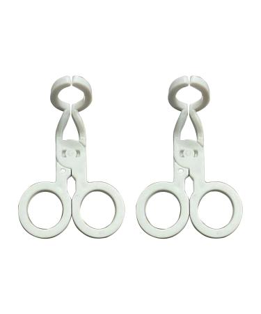 2PCs ergonomic tool for removing contact lenses Use for women to remove applications for everyday use.Tool for inserting and removing contact lenses on white
