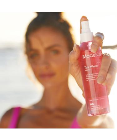 ModelCo Tanning Water - Self-Tan Body Spray - Hydrating Golden Tan - No Stains or Clogged Pores - 6.76 fl oz - Buy Online on GoSupps.com