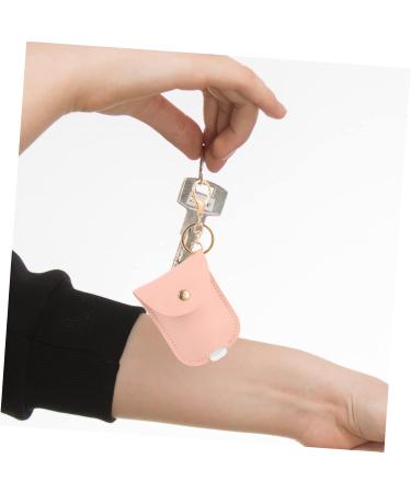 Fomiyes 4-Piece PU Leather Travel Bottles & Keyring Set | Stylish Hand Soap Medallion Key Decor | International Shipping Available - Buy Online on GoSupps.com