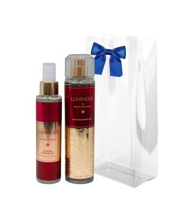 Bath & Body Works Luminous Fine Fragrance Body Mist 8 oz & Luminous Fine Fragrance Shimmer Body Mist 4.9 oz Gift Set packaging with a Blue bow