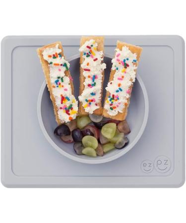 ezpz Mini Bowl (Pewter) - Silicone Suction Bowl for Infants + Toddlers with Placemat - Includes Travel Bag - Buy Online on GoSupps.com