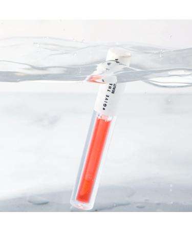 GIVE THEM LALA Drenched Lip Quencher - Moisturizing Clear Lip Gloss by Lala Kent | Cruelty-Free Lip Oil for Hydrated Lips - Buy Online on GoSupps.com