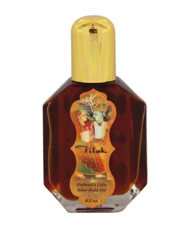 Prabhuji's Gifts | Perfume Attar Oil Tilak for Love - 0.5oz Rollon Juicy orange and Concord grape are laced with sweet saffron and rosewood all supported by cozy vanilla and almond
