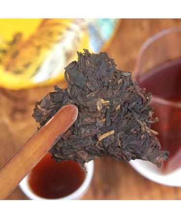 HELLOYOUNG 357g de g teau au th Pu'er bio Golden Charm du Yunnan Traditionnellement frit la main ce g teau vert au go t apaisant est id al pour accompagner vos plats Th pu-erh Pu'er Tea - Buy Online on GoSupps.com
