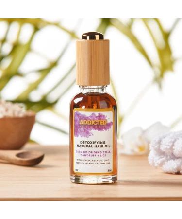 Addicted Beauty Detoxifying Natural Hair Oil | Nourish & Revitalize for All Hair Types International Shipping Available - Buy Online on GoSupps.com