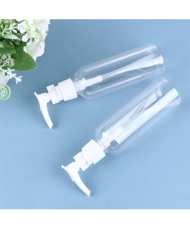 Lurrose 4-Piece Travel Bottles Set | Refillable 100ml Pump Dispenser Shampoo Donor | Ideal for Travel & Business Trips - Black & White - Buy Online on GoSupps.com