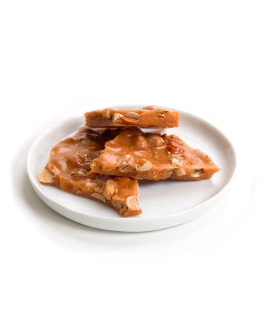 Buy Collin Street Bakery Texas DeLuxe Peanut Brittle Handcrafted Candy from Corsicana 14oz | International Shipping Available - Buy Online on GoSupps.com