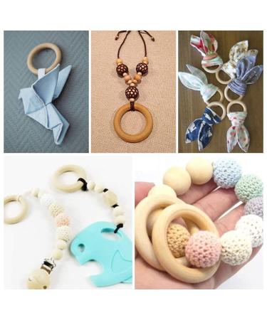Organic Wooden Teething Rings - Set of 10 Smooth Teething Toys | 7cm & 5cm Diameter | Safe & Natural Baby Comfort - Buy Online on GoSupps.com