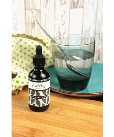 Earthley Wellness Gut Health Oil Natural Digestive & Immune Support Anti-Inflammatory Support Herbal Blend with Cloves & Calendula (2oz) - Buy Online on GoSupps.com