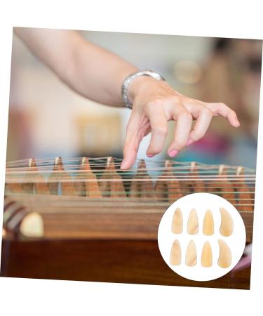 8 Pcs Guzheng nail pieces guzheng nails small guitar pick punch guzheng practice tools kids guitar picks guzheng prelectrum pipa child horns protection erhu musical instrument 2.7X1.2X0.1CM Yellow - Buy Online on GoSupps.com