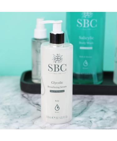 SBC Skincare Glycolic Resurfacing Serum - 300ml | 5% Glycolic Acid Serum For Dry Congested Skin | Vegan Friendly Body Serum | Exfoliating Serum For Ingrown Hairs - Buy Online on GoSupps.com
