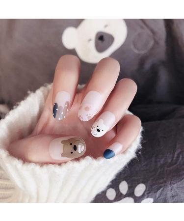 Hujl artificial nails "The cute bear -shaped false nails made of yellow egg are completely covered and the medium -length round wrong head is pressed on the girl's nails."