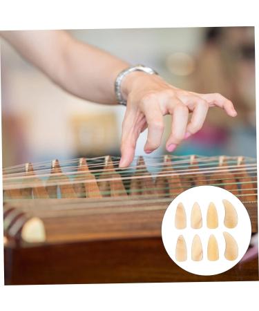 8 Pcs Guzheng nail pieces guitar picks for kids guitar nail picks Fingertip Protection Covers guitar thumb picks Guzheng Nail Covers kid stuff advanced protective cover child horns 3X1.2X0.1CM Light Yellow - Buy Online on GoSupps.com