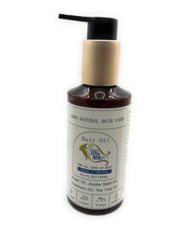 100% Natural Hair Oil made wiith Argan oil Jojoba Seed oil Rosemary oil & Tea Tree oil that moisturize hydrates and add shine to dry hair.