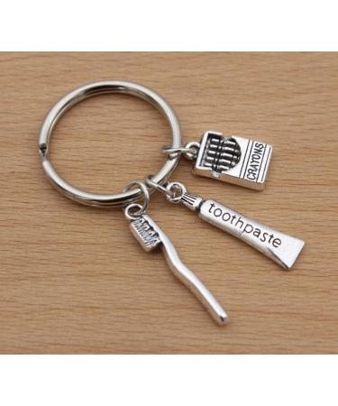 TARAKI Ancient Silver Toothpaste & Toothbrush Keychain | Unique Toothbrush Keyring & Zipper Pull - International Shipping - Buy Online on GoSupps.com