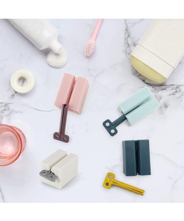 Rowphya 4-Piece Toothpaste Dispenser Set - Rolling Tube Squeezer & Holder for Bathroom - Save Toothpaste & Creams - Pink, White, Light Blue, Navy Blue - Buy Online on GoSupps.com