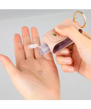 Mozeat Lens Hand Sanitizer Keychain - 2 Pcs Portable Leather Holder Leakproof Empty Bottles in Black & Pink - Perfect for Travel and Hygiene - Buy Online on GoSupps.com