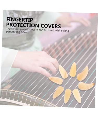 POPETPOP 8 Pcs Guzheng nail pieces Guzheng Tools instrument fake nails false nail tips Finger thumb picks Guzheng Nail Covers guitar nail picks portable child erhu musical instrument horns 3X1.2X0.1CM Light Yellow - Buy Online on GoSupps.com