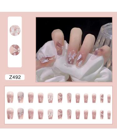 WOOXDYUK Nail Art Set - 24 Medium French Tip Press On Nails with Crystal Butterflies Imported Jelly Glue + Nail Rub & Remover for Perfect Nail Designs - Buy Online on GoSupps.com