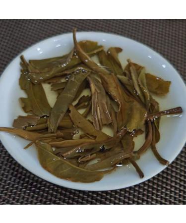 HQZM Yunnan Zhengqi Tang Old Spring Tea Puer Qizi Cake Raw Tea with Long Lasting Charm 200g - Buy Online on GoSupps.com