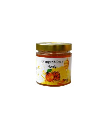 Orange blossom honey 500g in a glass.