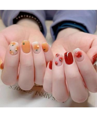 24 pieces of nails to stick on short red orange french press on nails full cover artificial nails with nail glue sticker acrylic fingernails for gluing for women & girls nail art orange heart